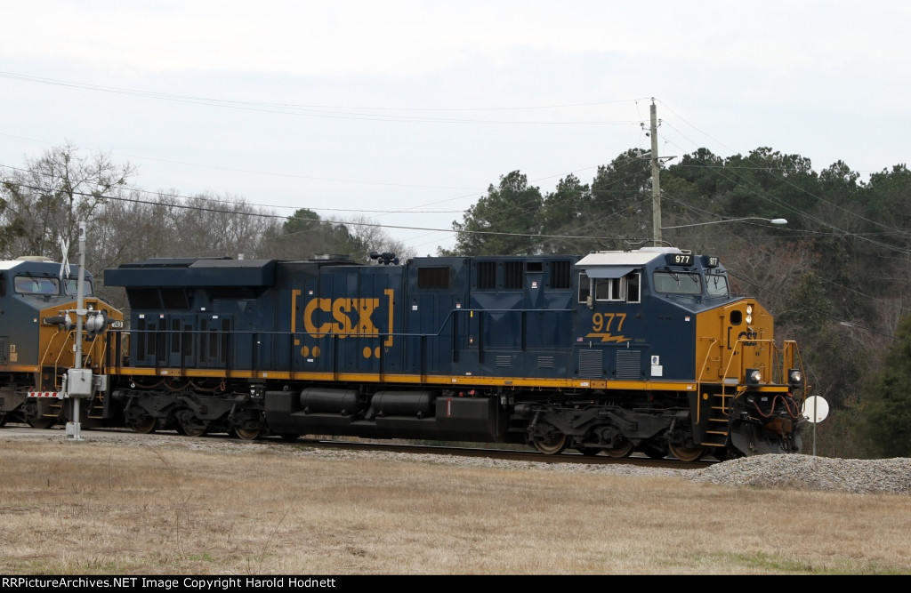 CSX 977 leads train E139-10 past Bridges Street